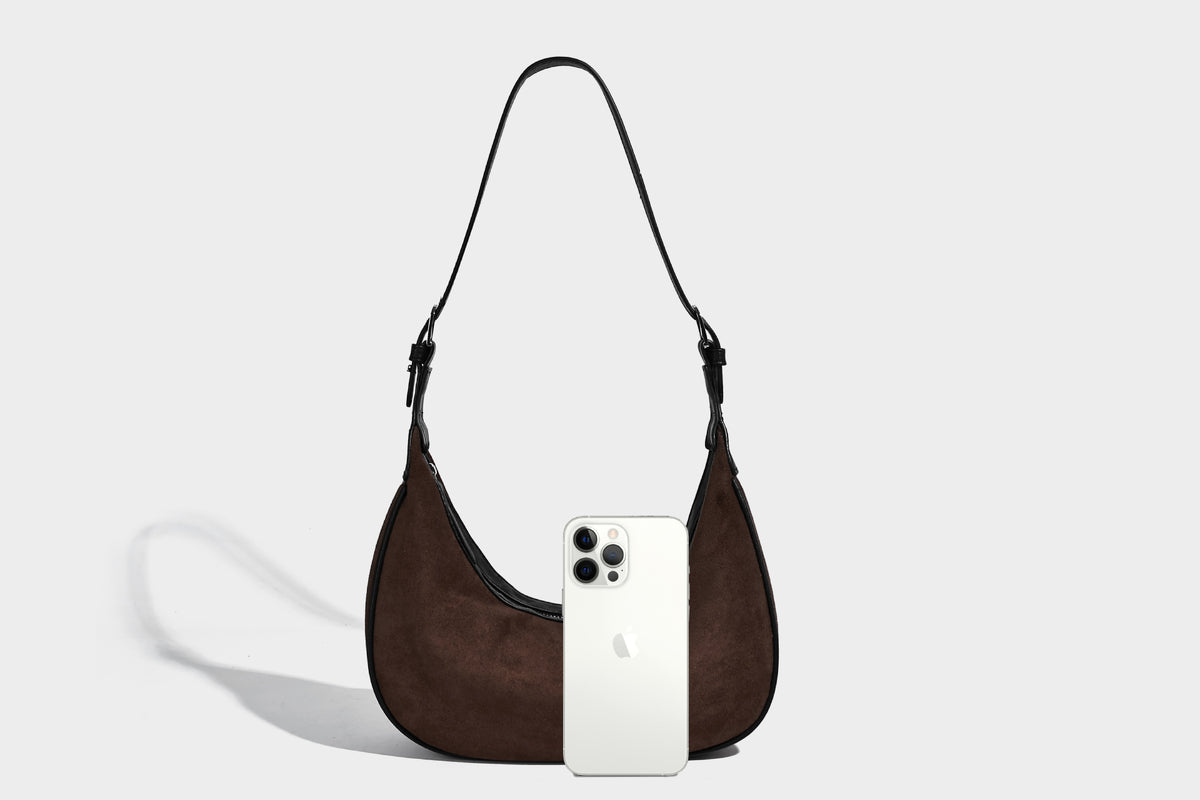 Crescent hobo shoulder bag in matte suede-look finish with black trim and adjustable strap, detail view 21