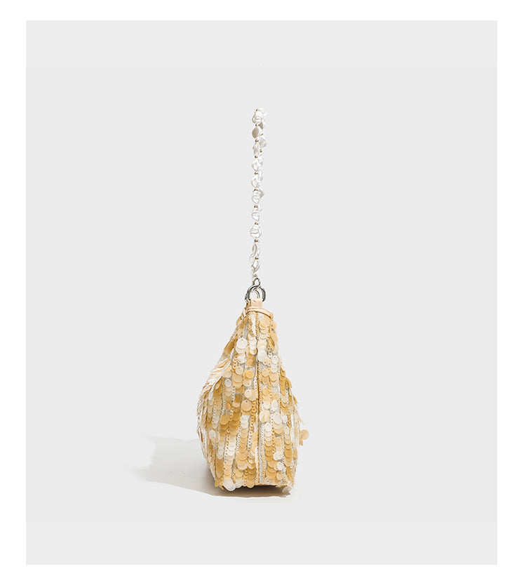 Small crescent sequin shoulder bag with pearl beaded strap and zip closure, detail view 13