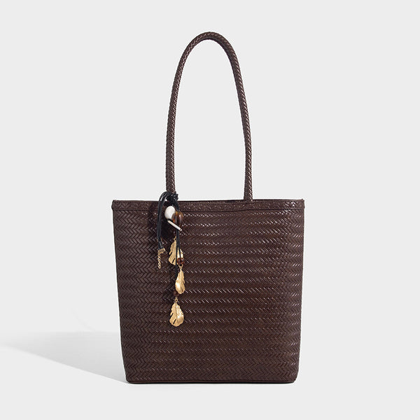 Structured woven herringbone tote bag with braided double shoulder handles in tan brown, shown with matching drawstring