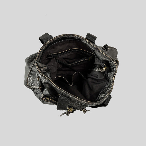 Slouchy crinkled pebbled leather-look convertible tote bag in gunmetal black with woven top handles, adjustable shoulder
