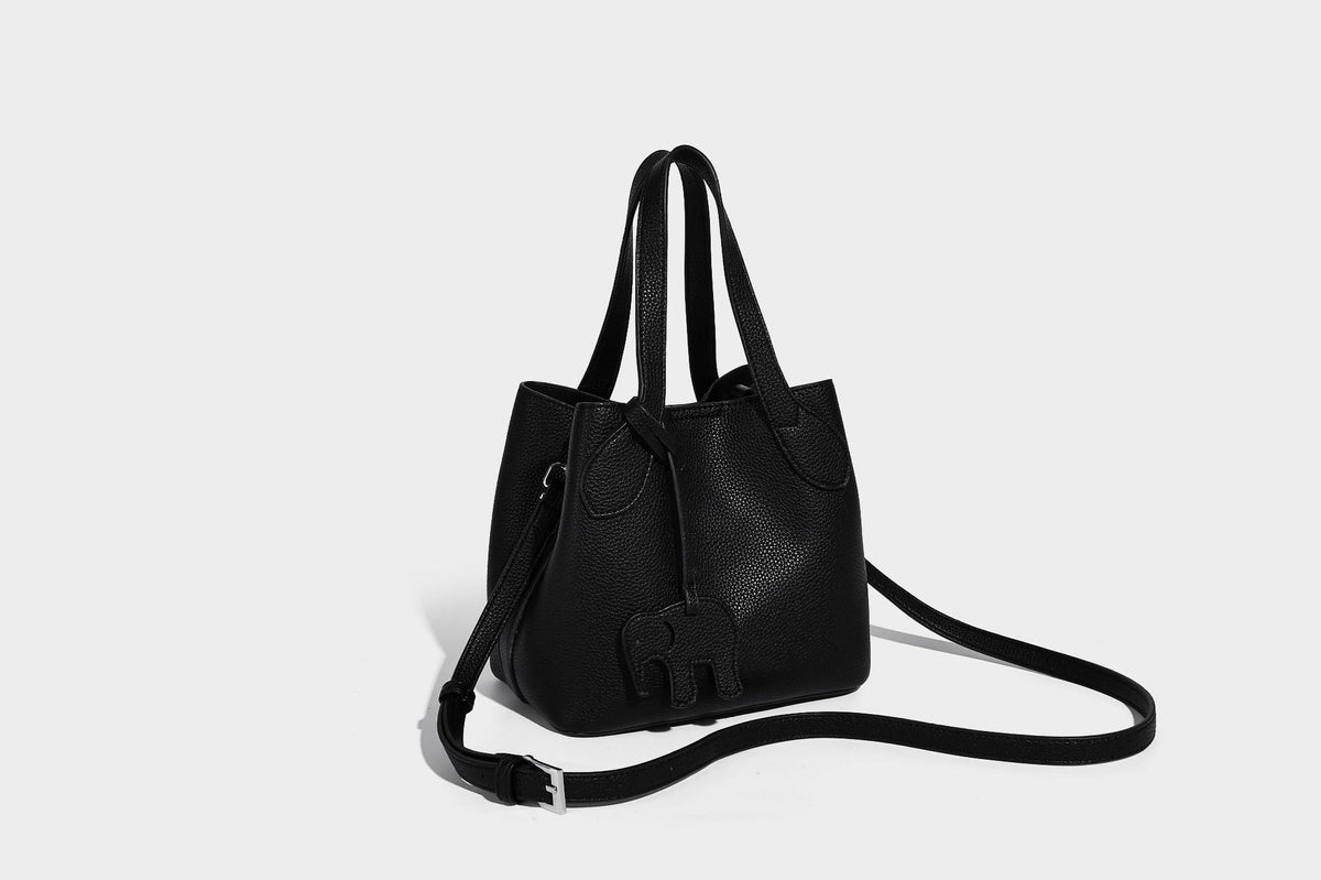 Compact pebbled bucket tote bag with elephant charm, twin top handles, and detachable crossbody strap, detail view 26