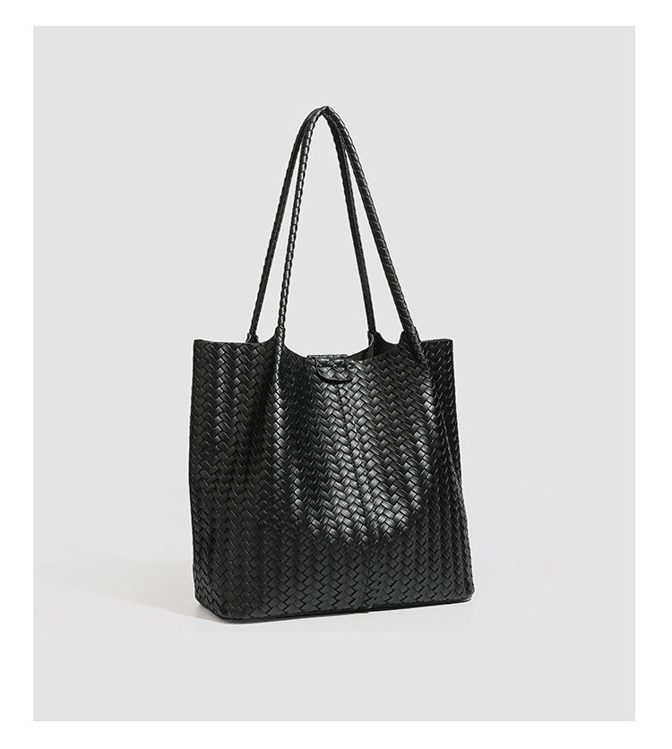 Large black basket-weave leather-look tote bag with long braided shoulder straps and matching woven zip pouch, detail view 13