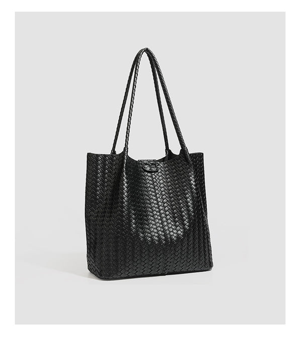 Large black basket-weave leather-look tote bag with long braided shoulder straps and matching woven zip pouch, detail view 13