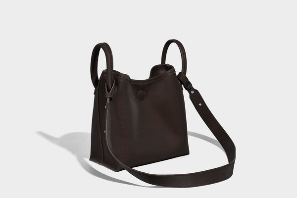Small structured matte pebbled tote bag with twin top handles and removable zip pouch, detail view 16