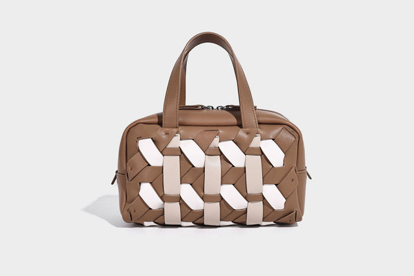Small structured satchel bag with two-tone woven front panel, dual top handles, and detachable crossbody strap in tan brown