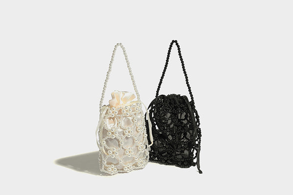 Small pearl-beaded lattice drawstring bucket bag with beaded shoulder strap and ribbon closure, detail view 29