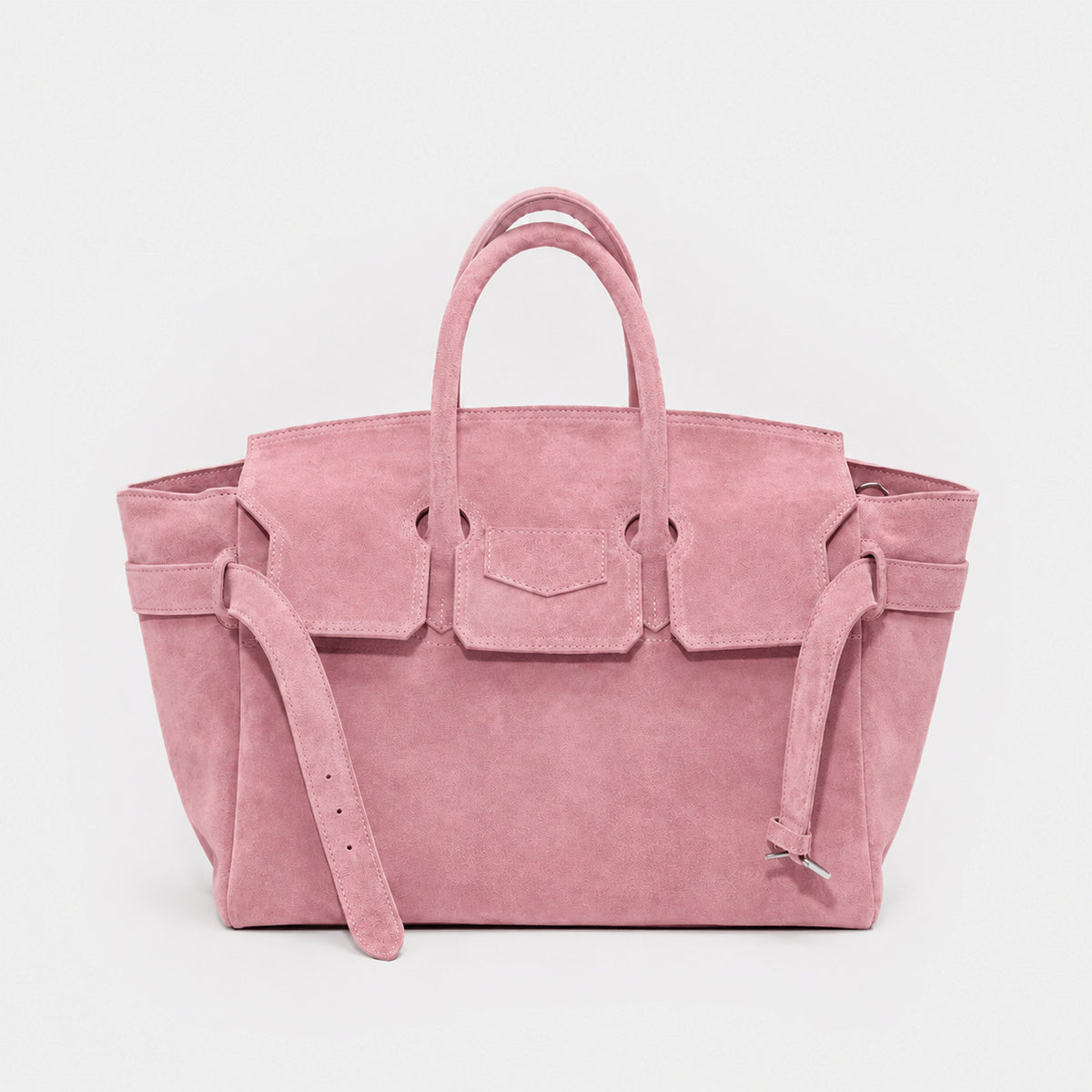 Large structured trapezoid tote bag in matte suede-like finish with dual top handles and belt strap buckle detail, front view