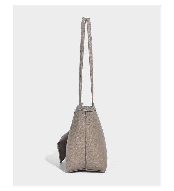 Structured pebbled leather-look tote bag in taupe with long shoulder strap, detachable zip pouch, and pink tulip flower