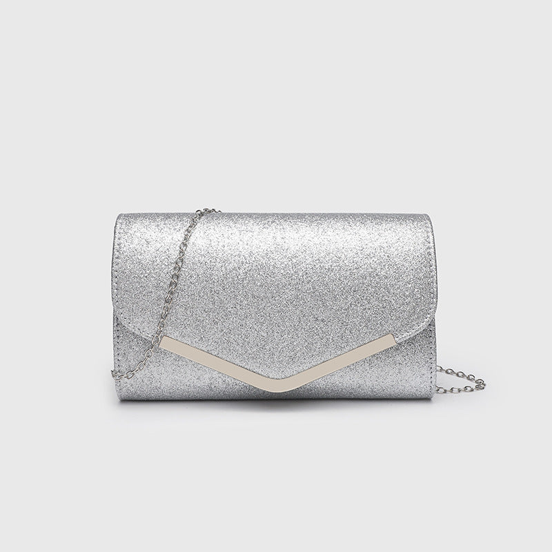 Structured glitter envelope clutch bag with gold-tone V-bar hardware and detachable chain strap, detail view 7
