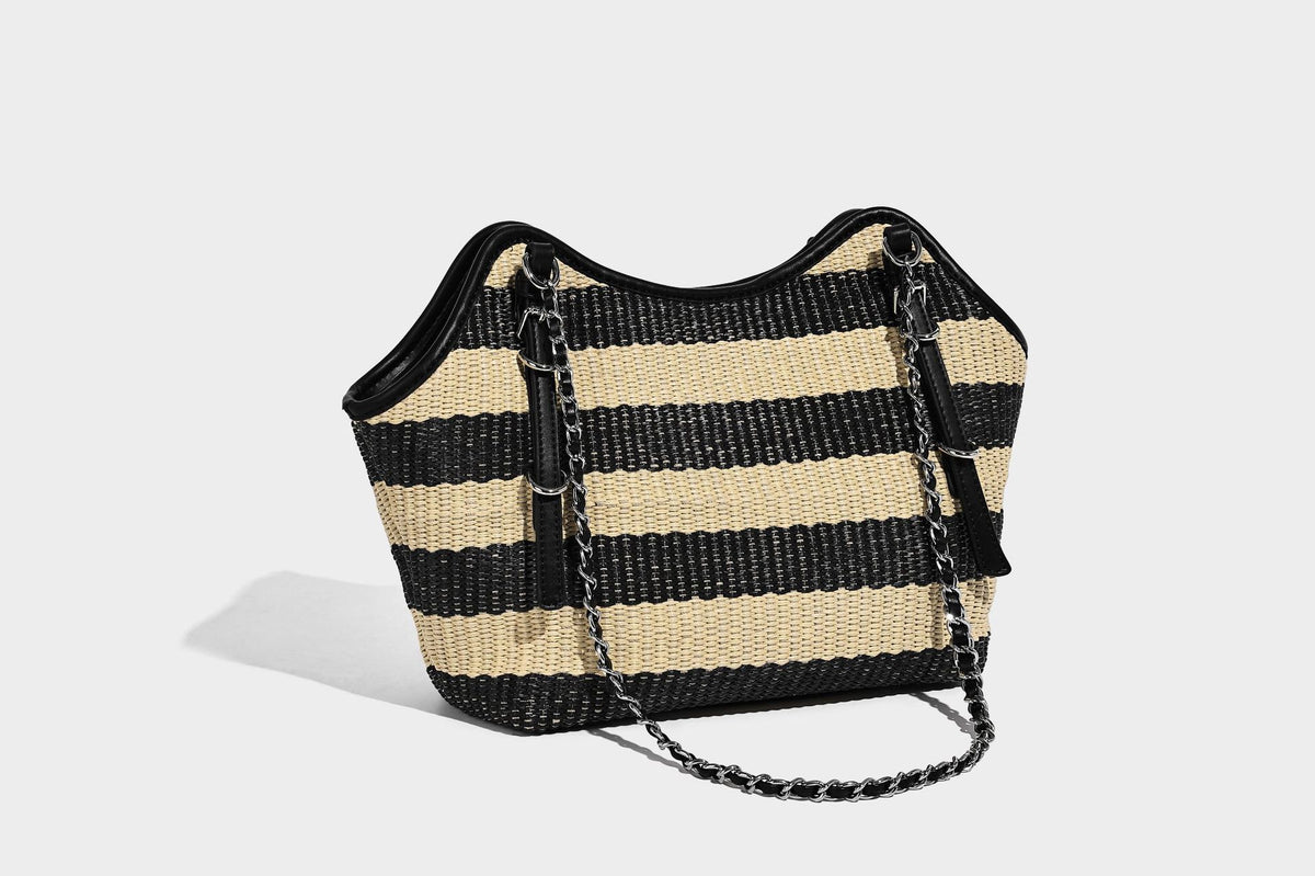 Black and natural striped woven tote bag with chain shoulder strap and silver-tone turn-lock hardware, detail view 19