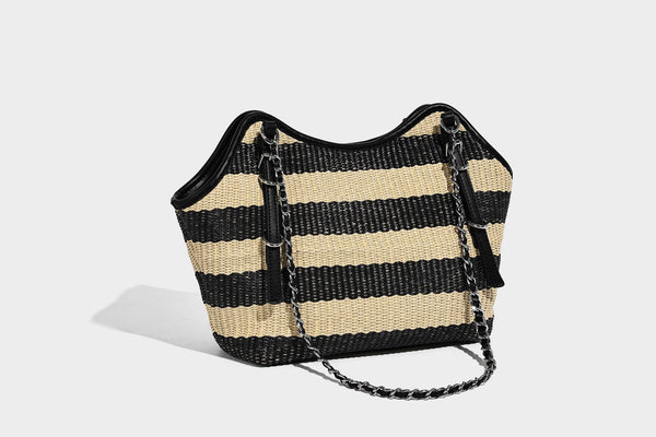 Black and natural striped woven tote bag with chain shoulder strap and silver-tone turn-lock hardware, detail view 19