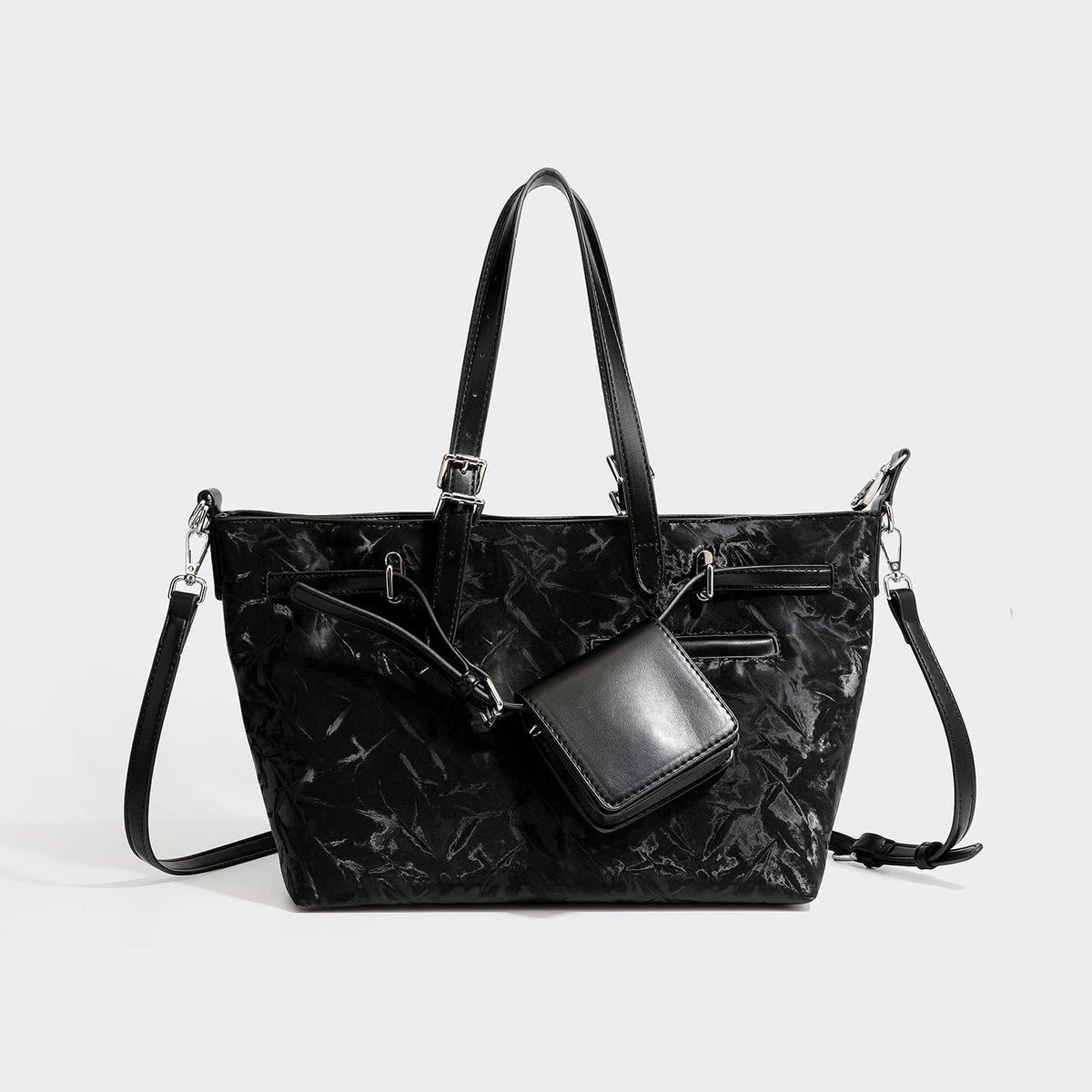 Glossy crinkled metallic-finish tote bag in brown with smooth leather-look top handles, silver-tone hardware, and attached