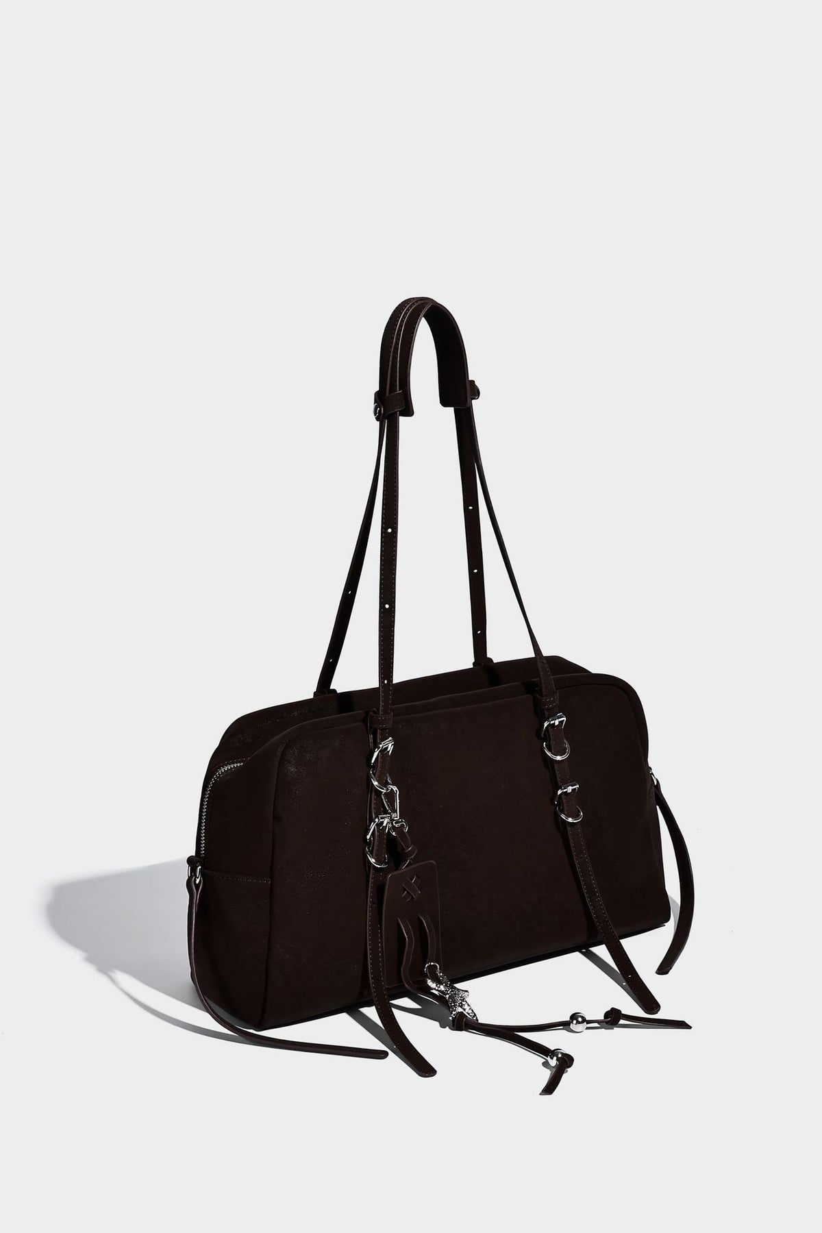 Structured rectangular matte suede-like shoulder bag with silver-tone hardware, zip closure, double top handles, and, detail