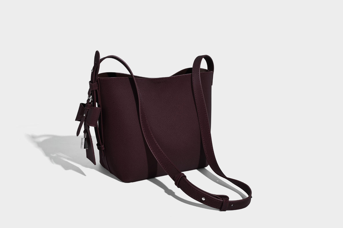 Pebbled leather-look bucket shoulder bag with zip inner pouch and adjustable crossbody strap, detail view 30