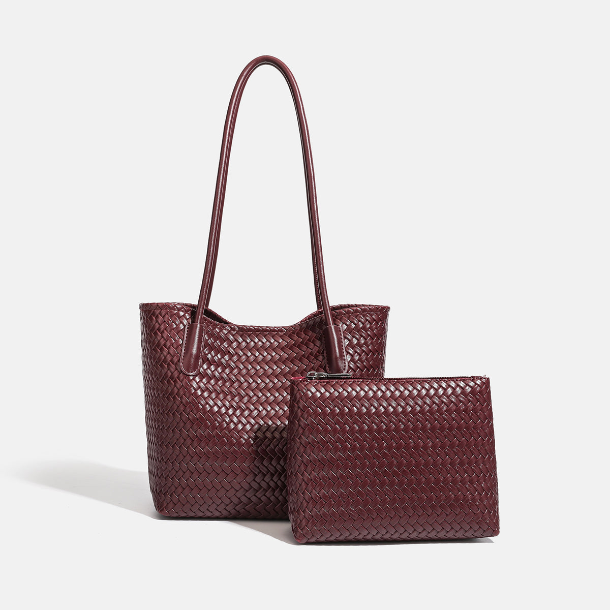 Structured woven leather-look tote bag with long shoulder straps and matching zippered pouch, detail view 9