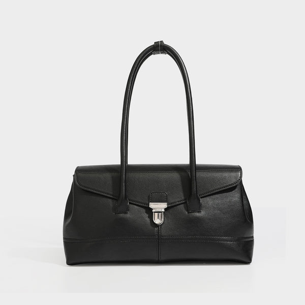 Structured rectangular satchel bag with dual rounded top handles and central metal turn-lock flap closure, detail view 2