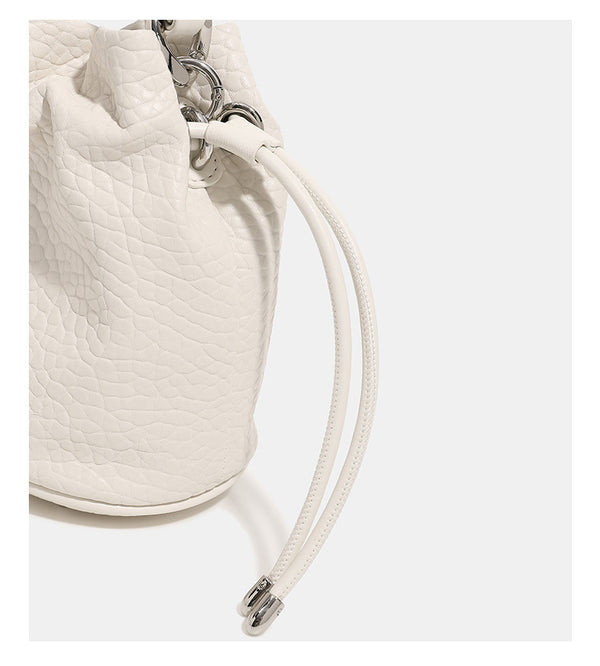 Mini pebbled leather-look bucket bag with chunky silver-tone chain handle and drawstring closure, detail view 16