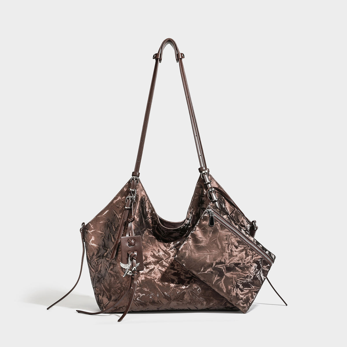 Slouchy crinkle-finish shoulder tote bag with silver hardware and attached zip pouch, detail view 5