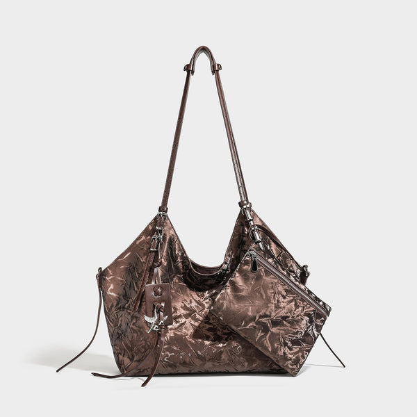 Slouchy crinkle-finish shoulder tote bag with silver hardware and attached zip pouch, detail view 5