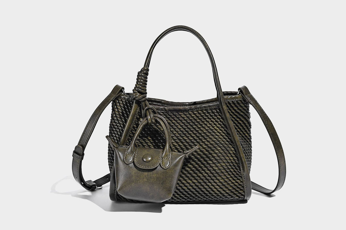 Large structured woven rope-texture tote bag with smooth leather-look trim, knotted dual top handles, detachable mini front