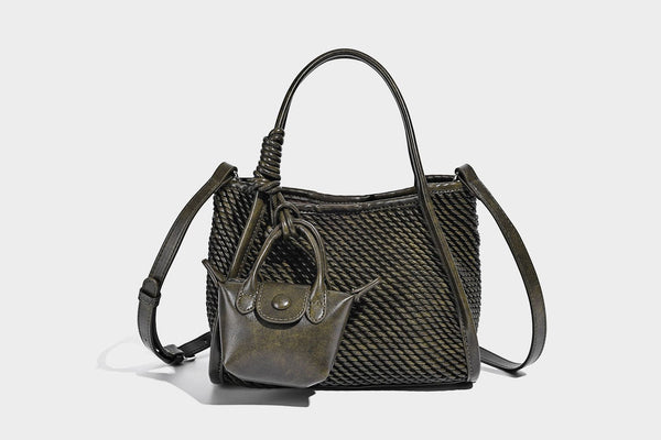 Large structured woven rope-texture tote bag with smooth leather-look trim, knotted dual top handles, detachable mini front