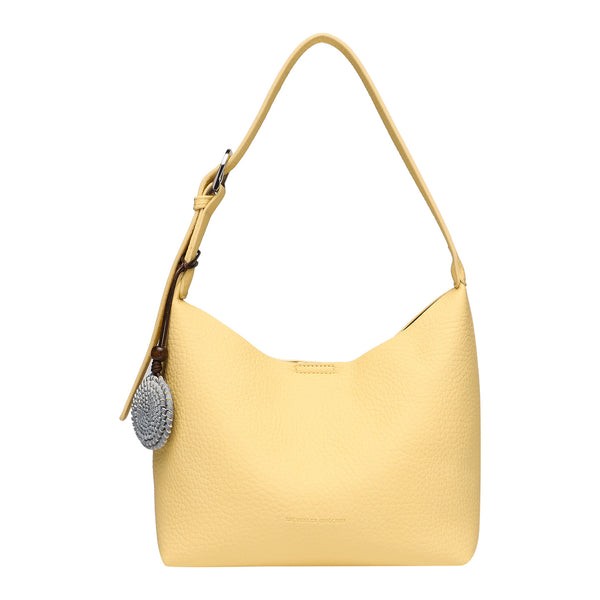 Slouchy hobo shoulder bag in pale yellow pebbled texture with woven charm, adjustable strap, matching zip pouch, and, detail