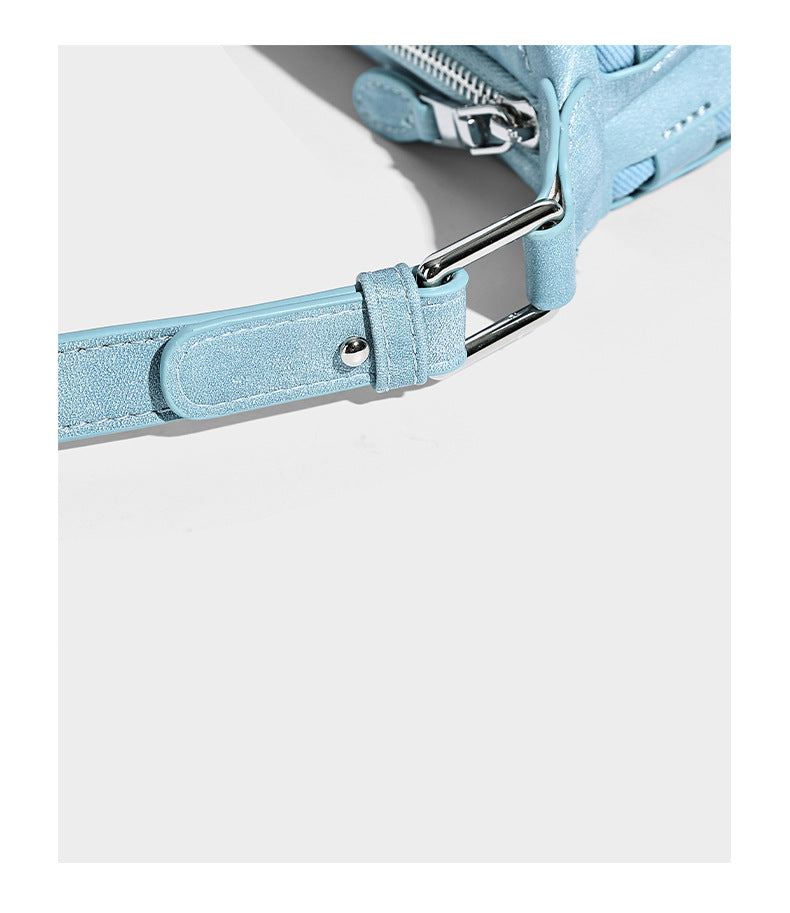 Small woven convertible shoulder bag with top zipper, silver-tone hardware, and detachable crossbody strap, detail view 18