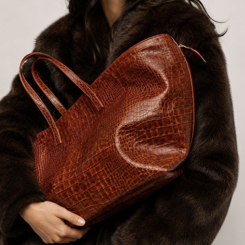 Oversized glossy crocodile-embossed tote bag with long double shoulder straps, front view