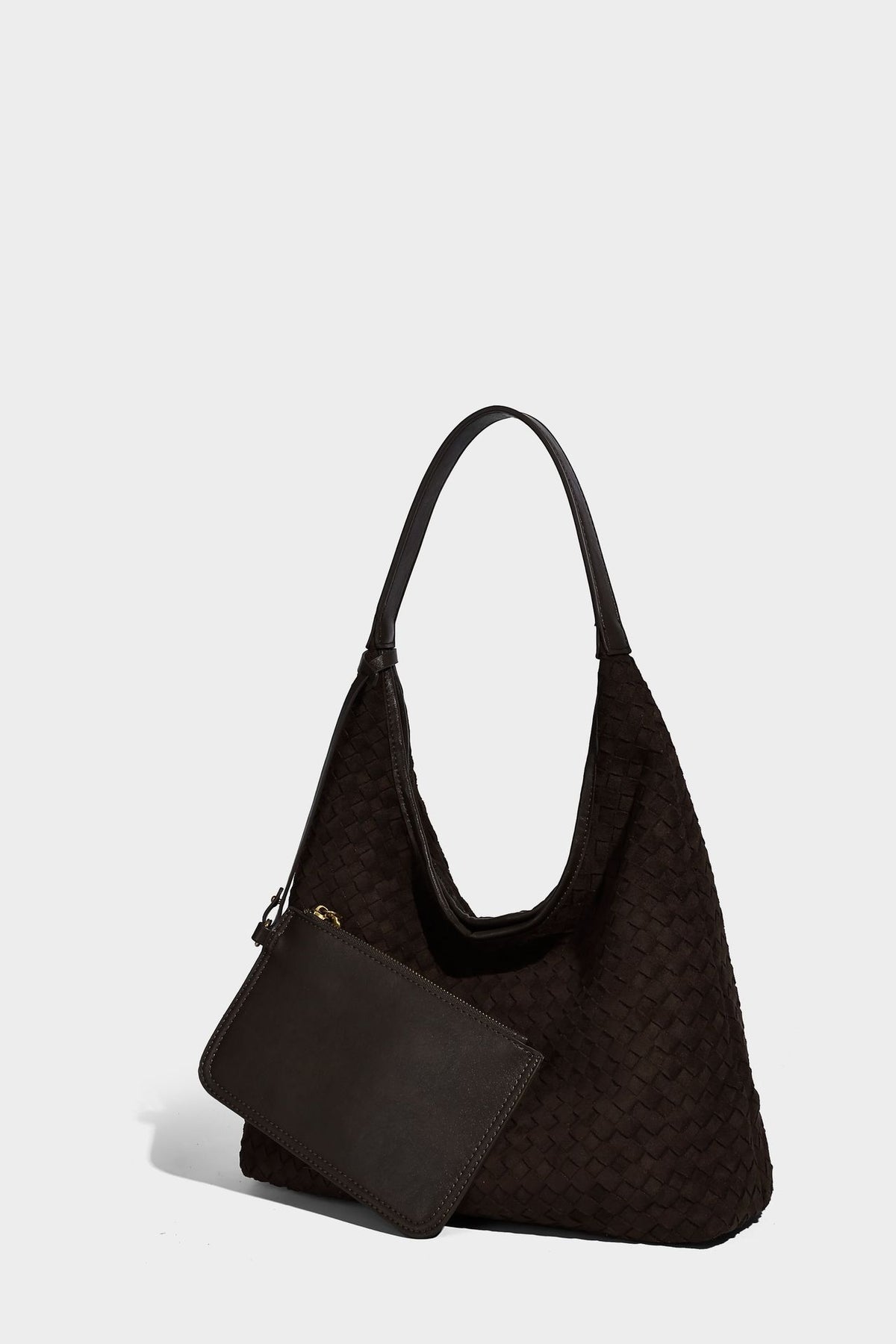 Large slouchy woven hobo tote bag with curved shoulder strap and triangular silhouette, detail view 12