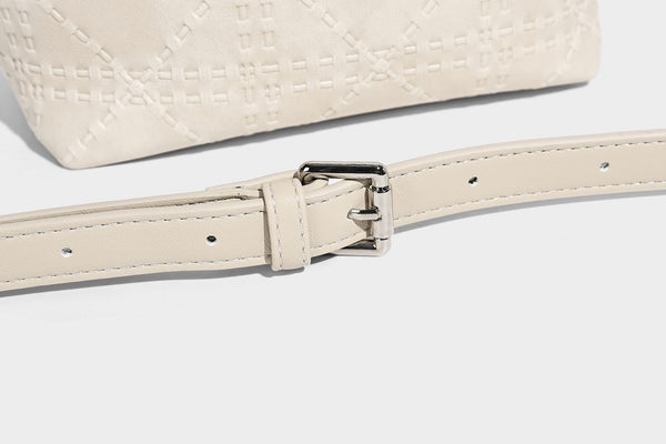 Small embossed half-moon shoulder bag with top zipper, detachable front pouch, and adjustable slim strap, detail view 24