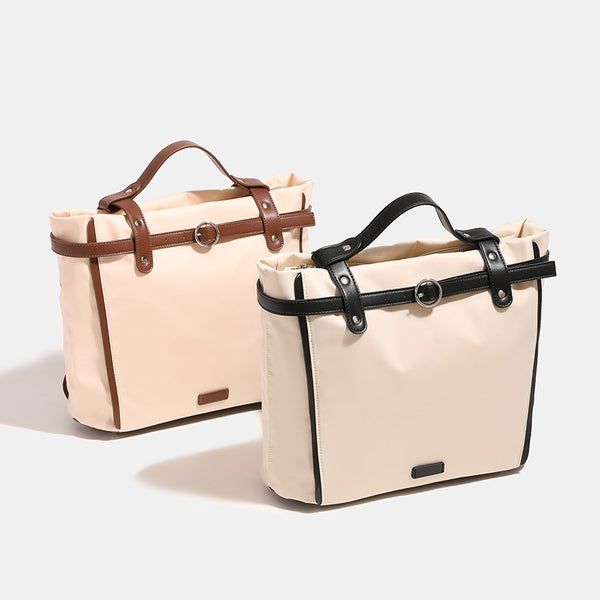 Große wandelbare Tote-Bag in Creme mit Riemen in Lederoptik und Ringschnallendetail, Detailansicht 2