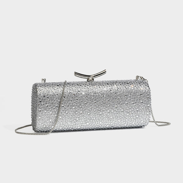 Structured rectangular hard-case clutch bag covered in all-over rhinestone crystal embellishment with curved kiss-lock top