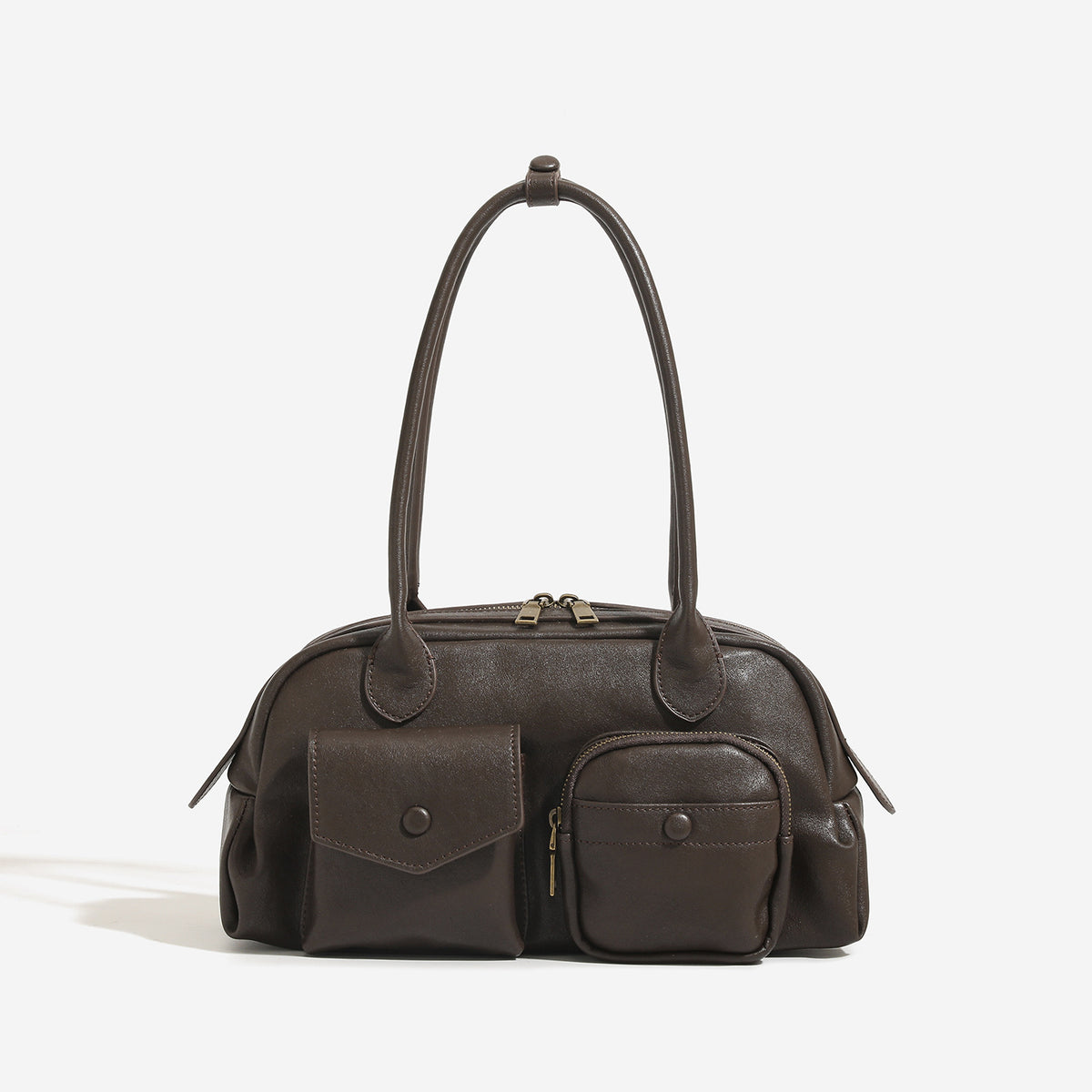 Structured retro bowling-style top-handle handbag with dual zip closure, front snap-flap pocket, and front zip pocket, detail