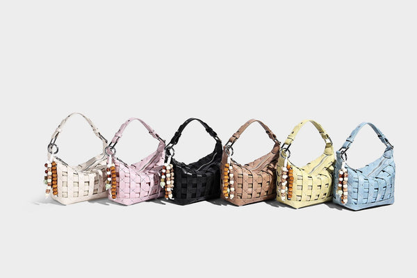 Small woven convertible shoulder bag with top zipper, silver-tone hardware, and detachable crossbody strap, detail view 19