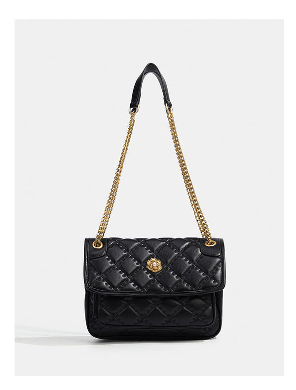 Compact diamond-quilted flap shoulder bag with gold-tone chain strap and floral turn-lock clasp, detail view 12