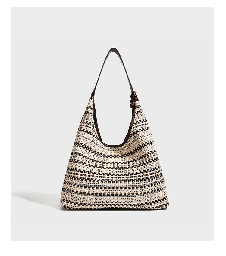 Slouchy woven stripe hobo shoulder bag with black-and-white pattern and leather-look strap, detail view 16