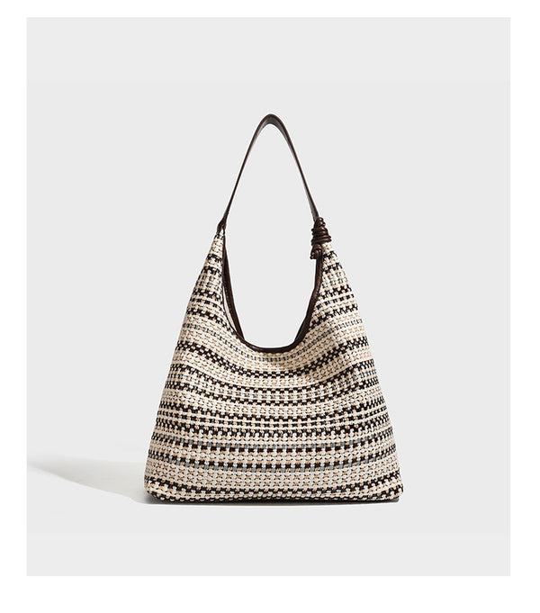 Slouchy woven stripe hobo shoulder bag with black-and-white pattern and leather-look strap, detail view 16
