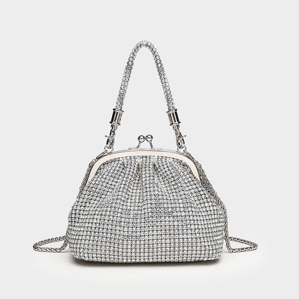 Kompakte Abendtasche mit rundum applizierten Strasssteinen, silberfarbenem Metallrahmen, Strass-Tragegriff und abnehmbarer Kette