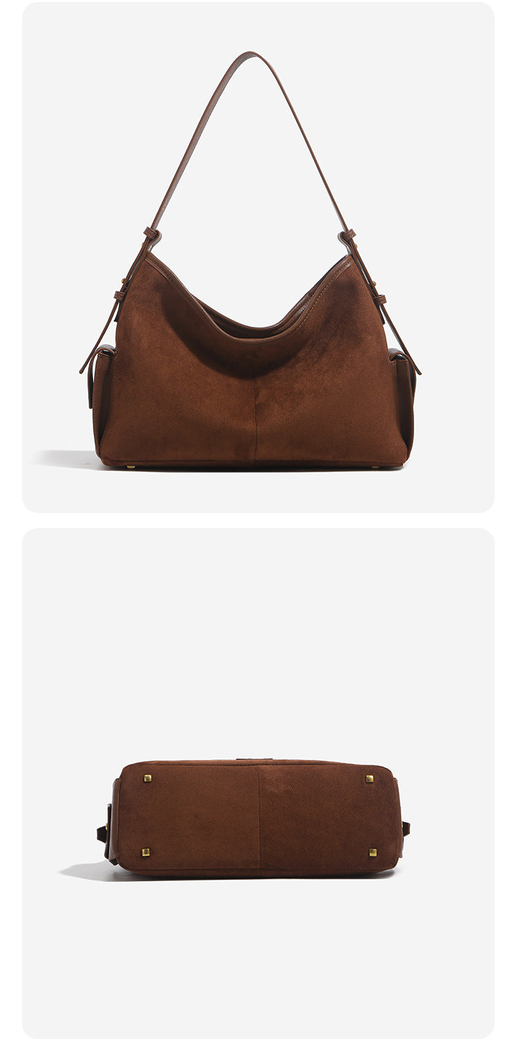Caramel brown slouchy hobo shoulder bag with matte suede-like finish, braided tassel charm, brass-tone hardware, and, detail