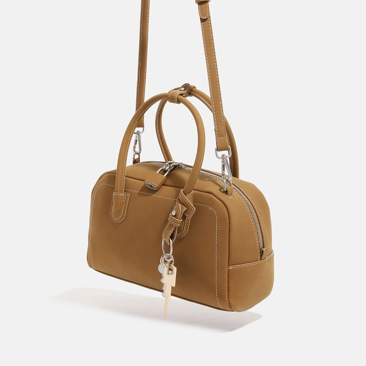 Compact retro Boston satchel bag with matte suede-look finish, twin rounded top handles, double zip closure with silver-tone