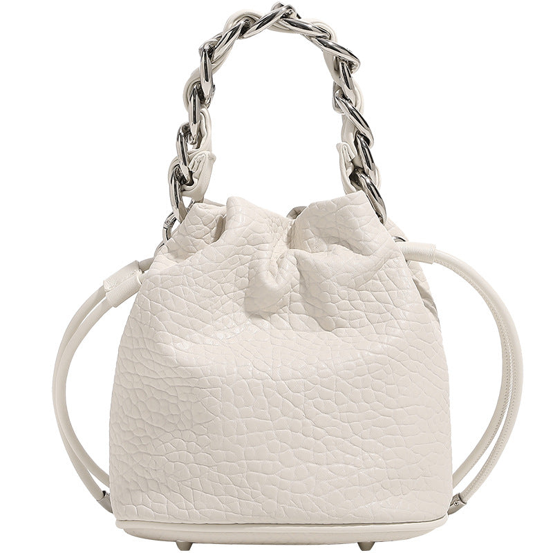 Mini pebbled leather-look bucket bag with chunky silver-tone chain handle and drawstring closure, detail view 5