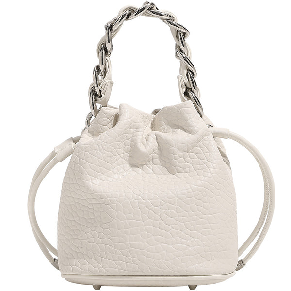 Mini pebbled leather-look bucket bag with chunky silver-tone chain handle and drawstring closure, detail view 5