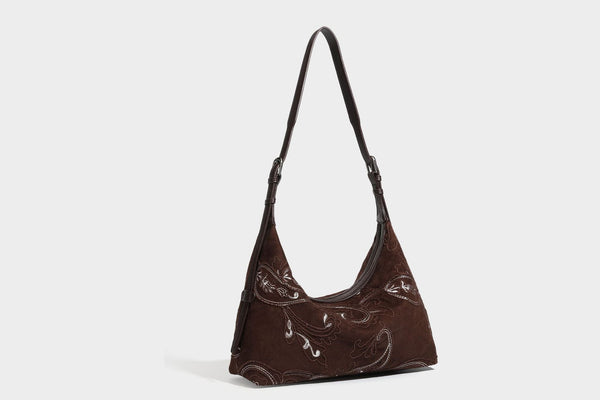 Deep chocolate suede-look hobo shoulder bag with tonal paisley floral embroidery, smooth dark leather-look trim, top zip