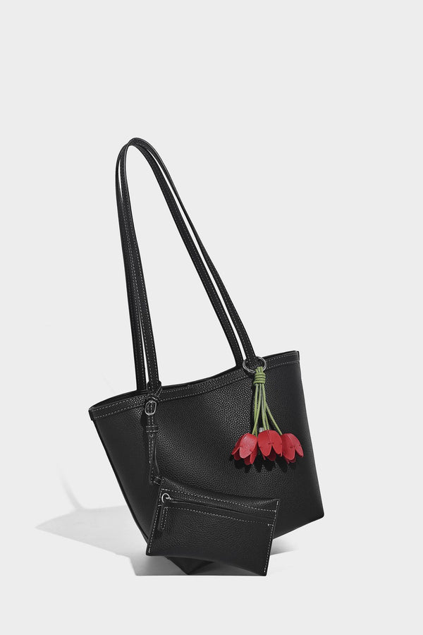 Structured pebbled leather-look tote bag in taupe with long shoulder strap, detachable zip pouch, and pink tulip flower