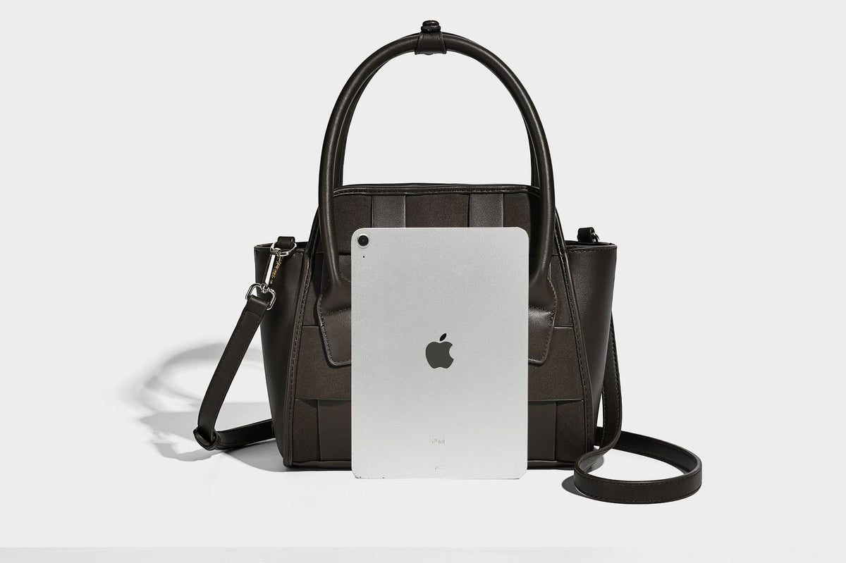 Small structured woven-panel mini tote bag with double top handles and detachable crossbody strap in matte leather-look