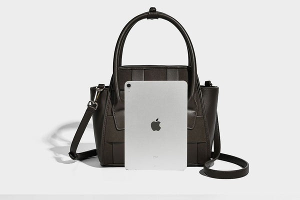 Small structured woven-panel mini tote bag with double top handles and detachable crossbody strap in matte leather-look