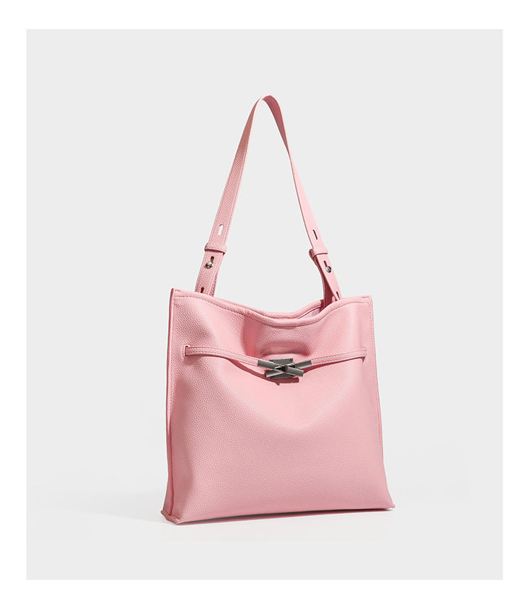 Large structured tote bag in pebbled leather-look finish with silver-tone twist-knot front detail and adjustable shoulder
