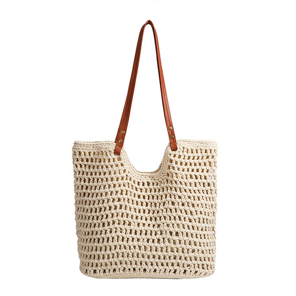 Open-knit woven tote bag with leather-look shoulder straps and brass-tone hardware in off-white, detail view 5