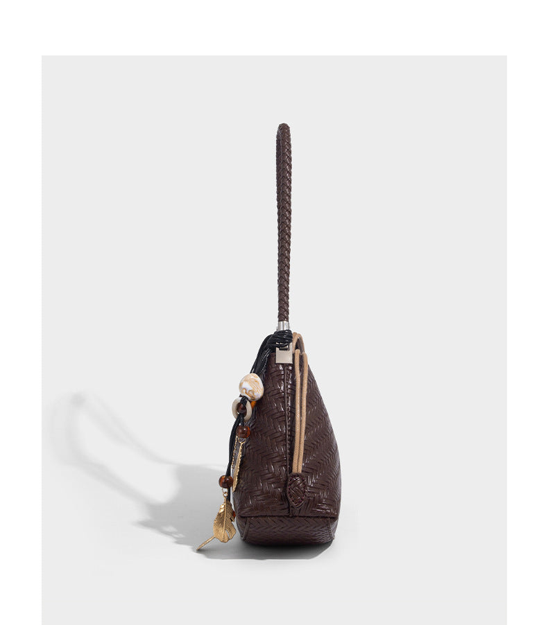 Woven leather-look hobo shoulder bag with braided strap and silver-tone hardware, detail view 17