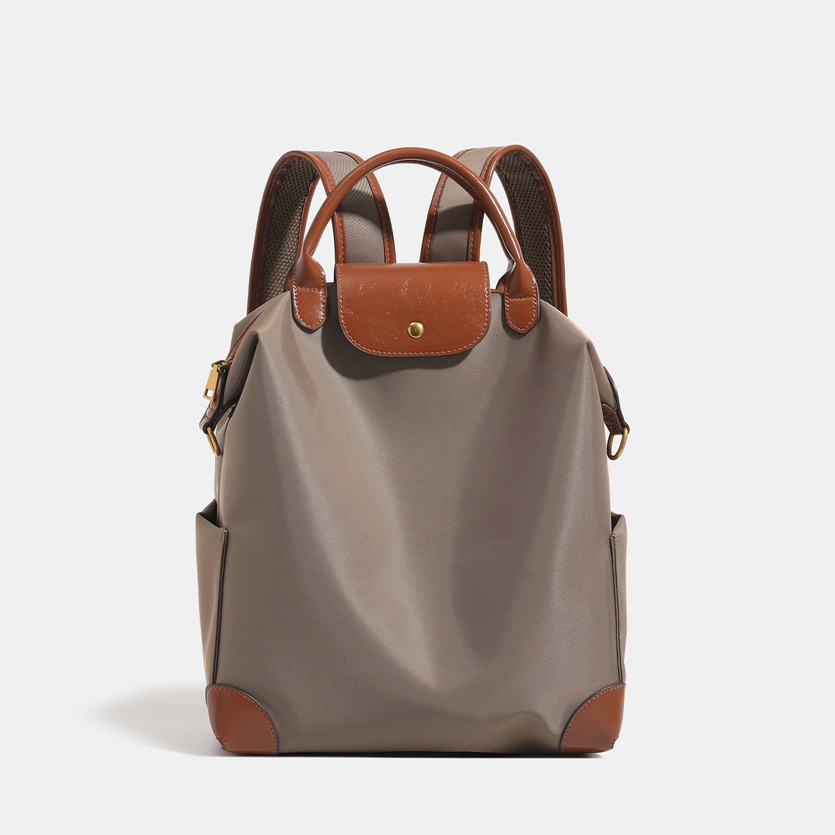 Soft rectangular nylon convertible backpack handbag with leather-look trim, snap-flap closure, top carry handles, padded